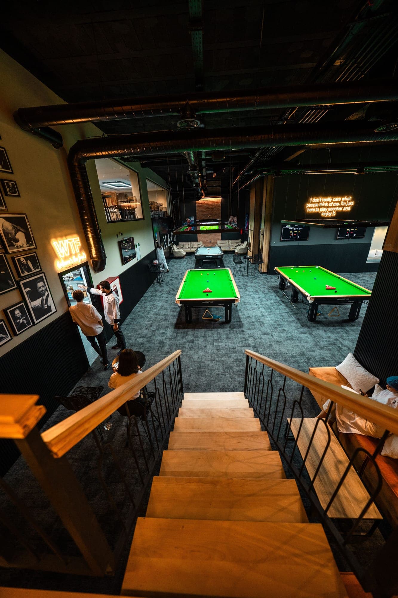 View of the snooker tables from the stairs